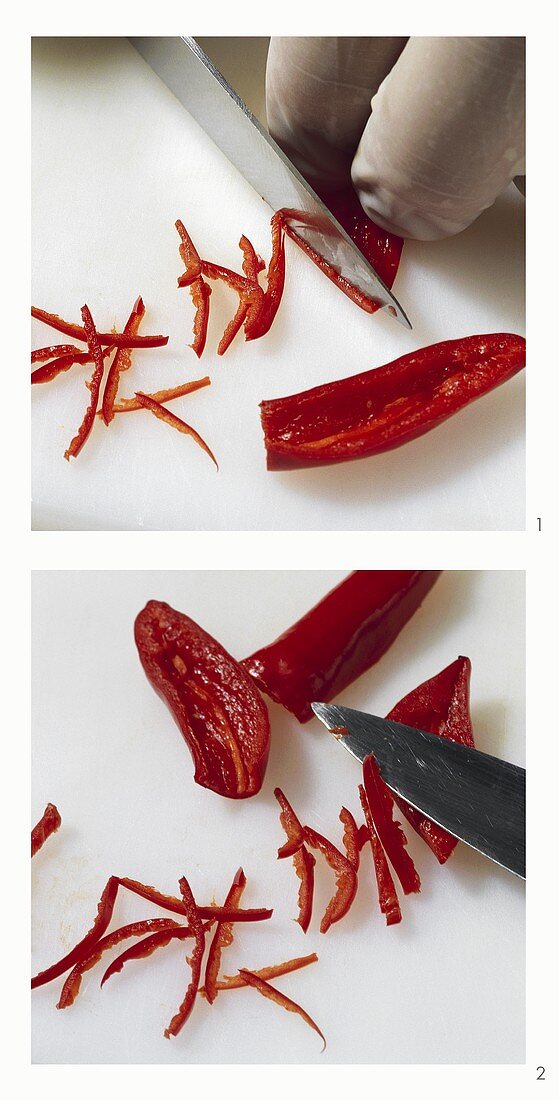 Cutting a chilli into thin strips