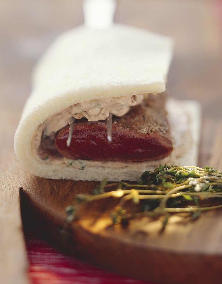 Preparing loin of venison in white bread crust