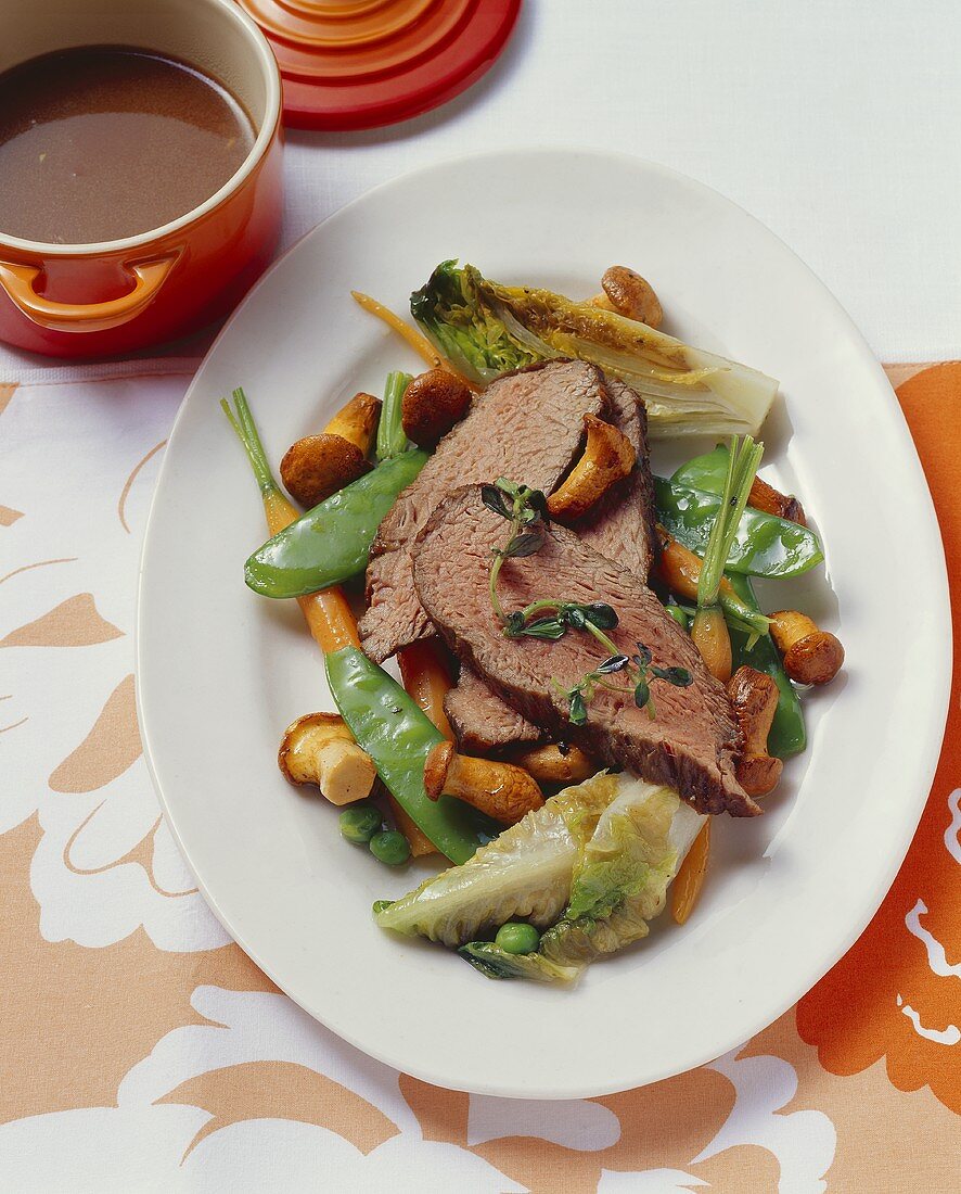 Boiled veal rump with braised romaine lettuce & chanterelles