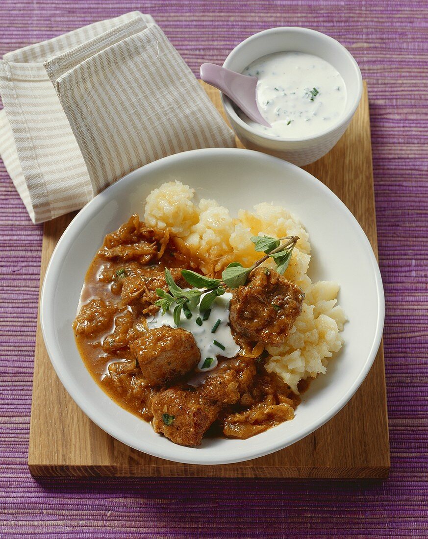 Goulash with onions, paprika, sauerkraut & fresh marjoram