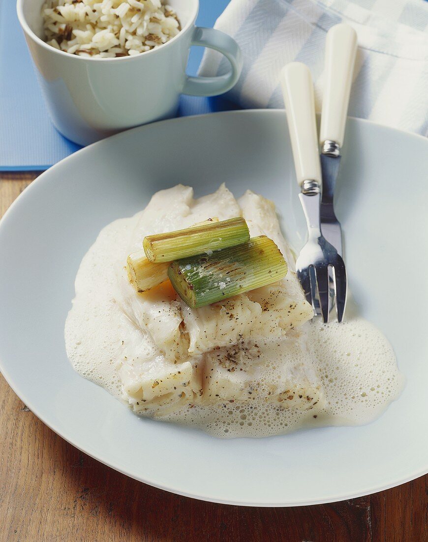 Steamed halibut with black tea and fried leeks