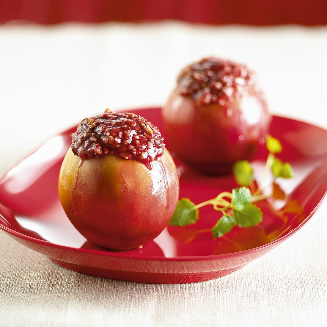 Two baked apples with cranberry- and pomegranate stuffing