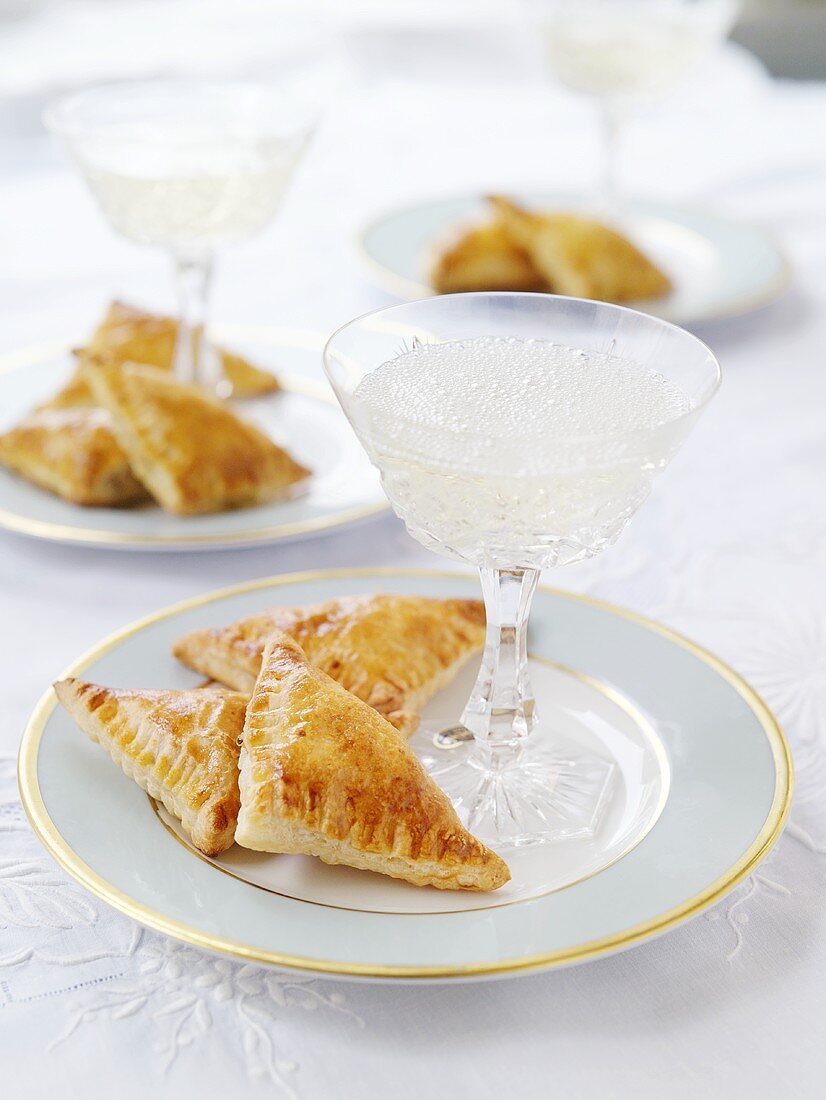 Pierogi with potato filling, sparkling wine (Poland)