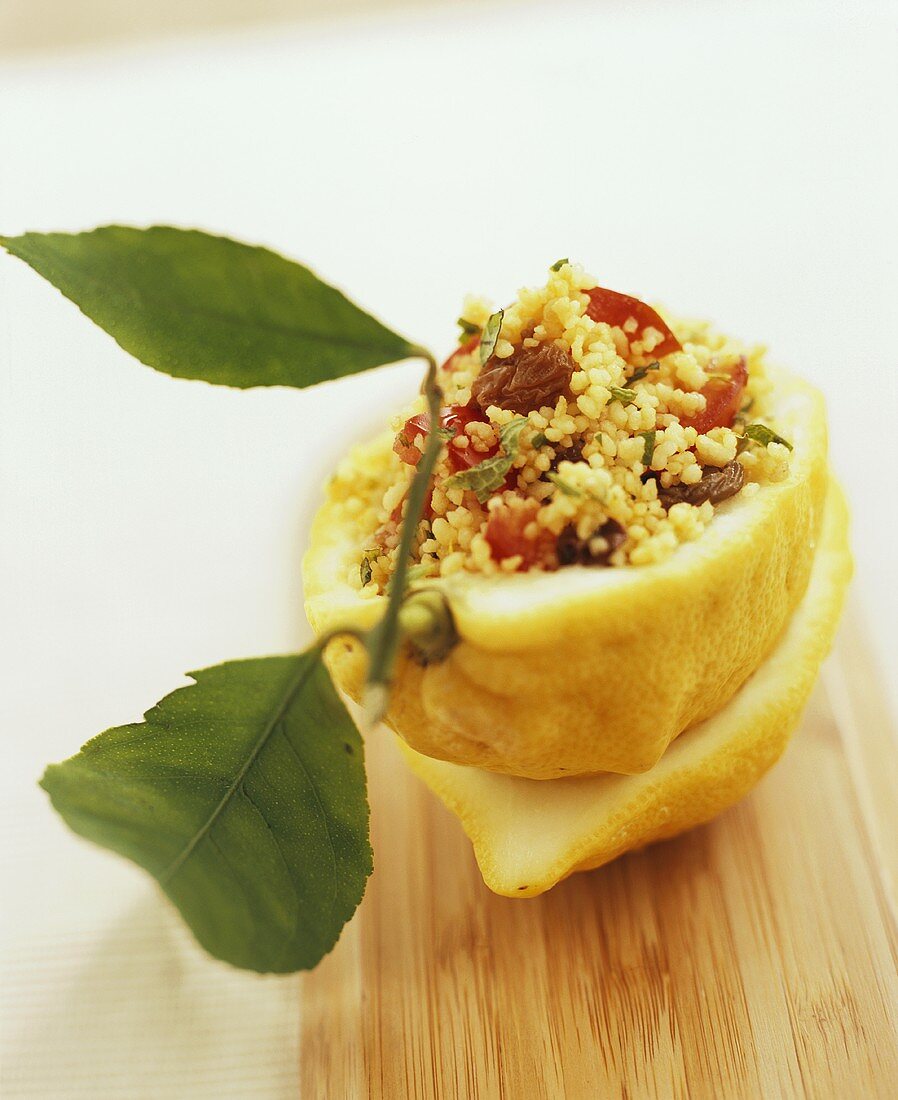 Half a lemon stuffed with couscous