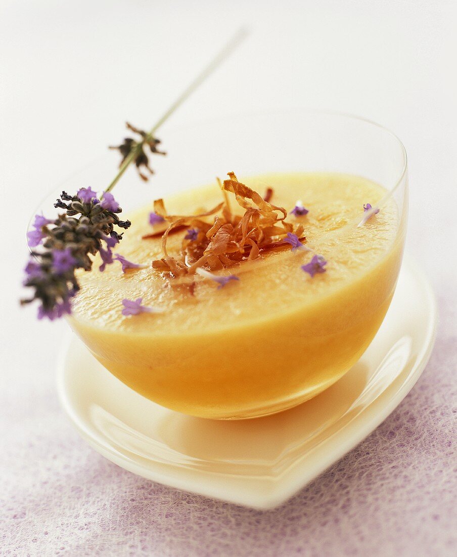 Chilled melon soup with lavender flowers