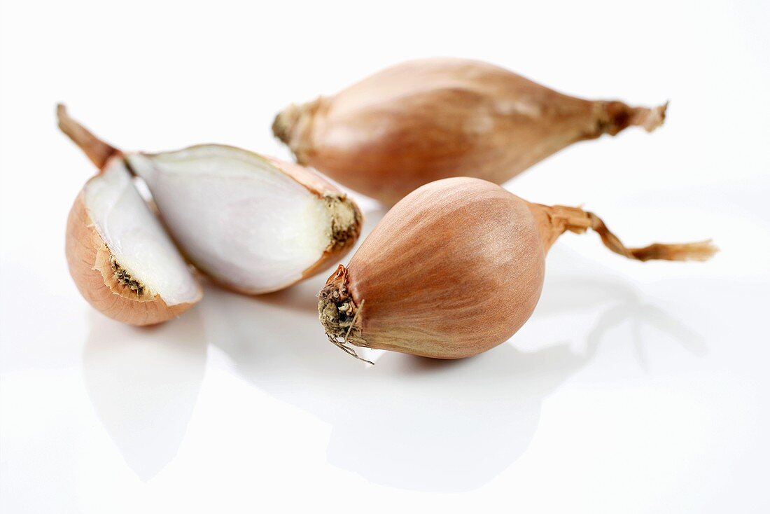 Shallots on white background