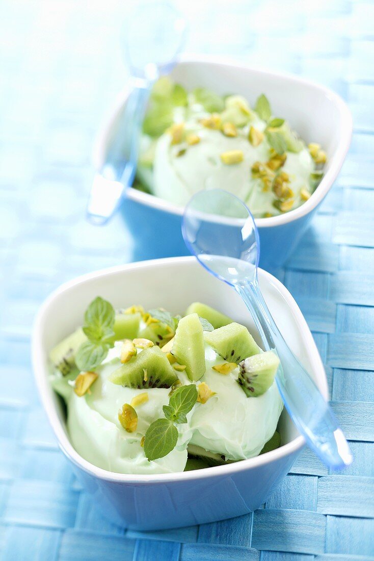 Pistachio ice cream with kiwi fruit and mint