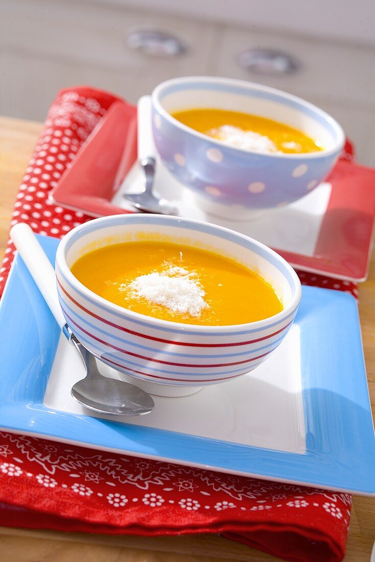 Pumpkin soup with Parmesan in two bowls