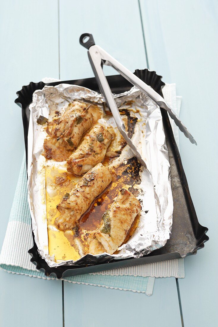 Chicken roulades on baking tray