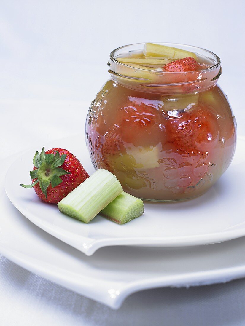 Rhubarb and strawberry compote in a jam jar