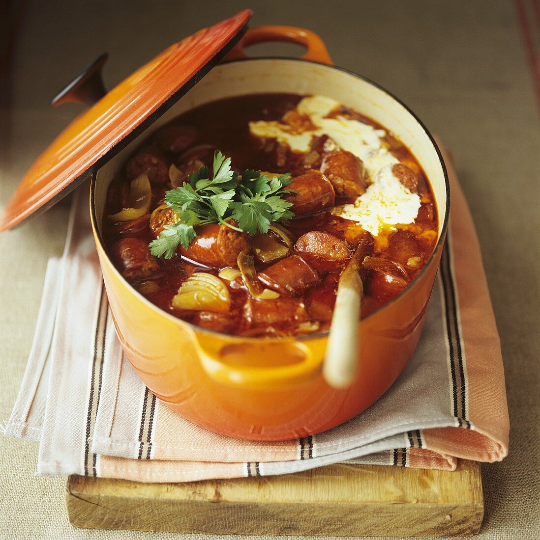 Chorizo stew with crème fraîche and parsley