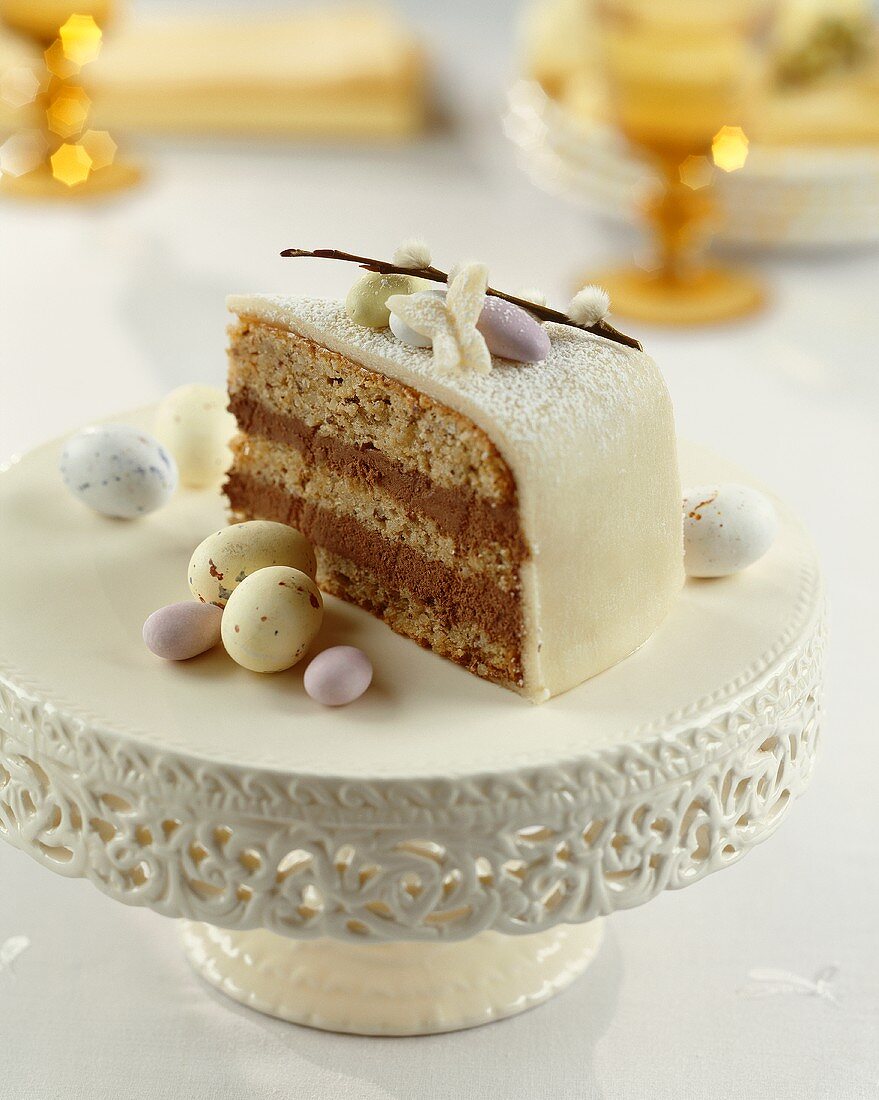 A piece of Easter cake with sugar eggs