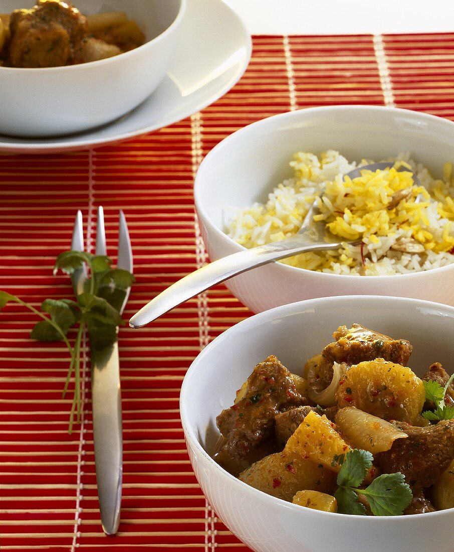 Lamb curry with pineapple, banana and Biryani rice