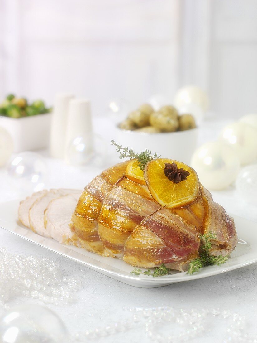 Bacon-wrapped rolled turkey roast for Christmas