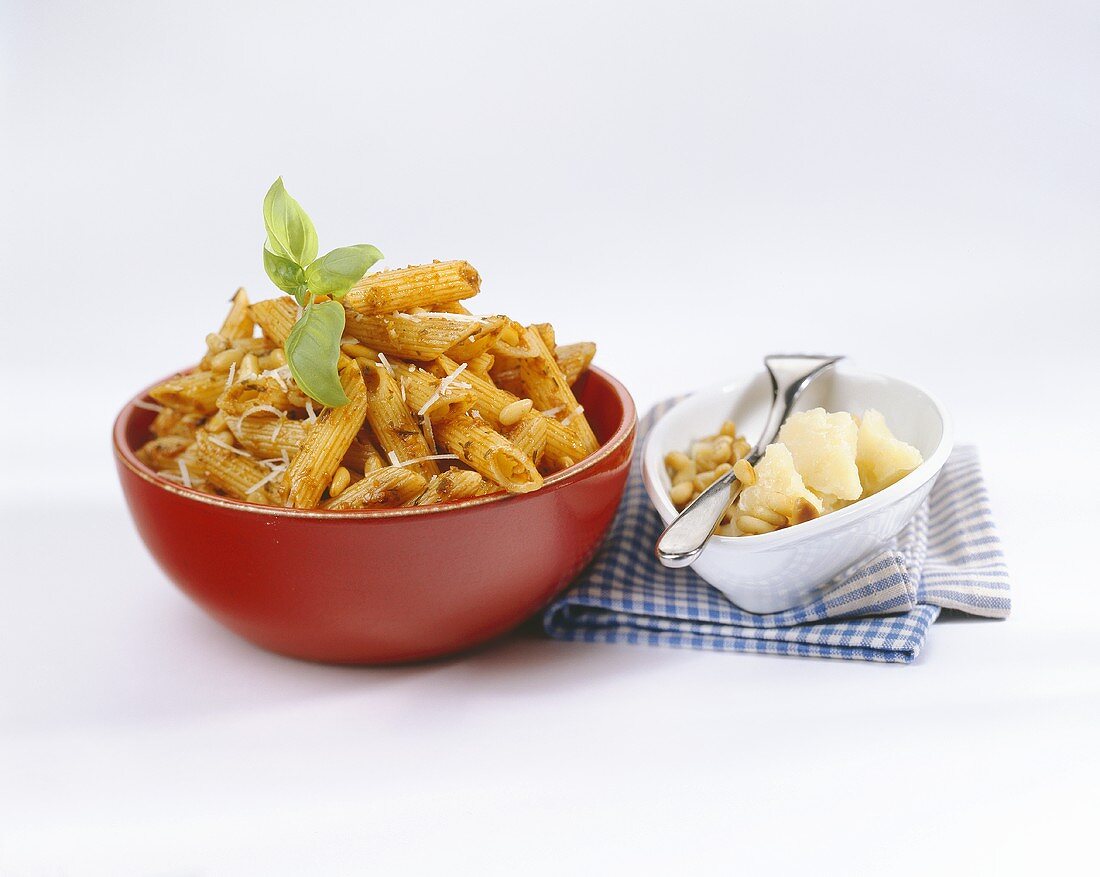 Penne with pesto rosso, Parmesan and pine nuts