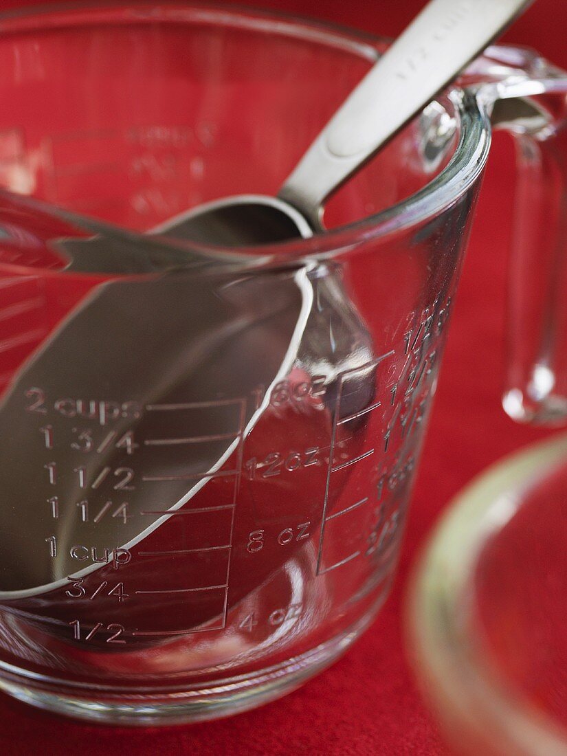 Measuring jug and measuring spoon