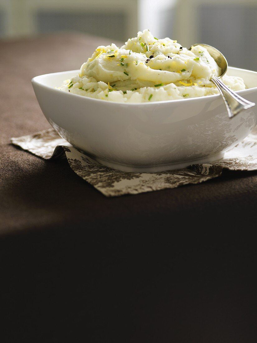Mashed potato with herbs in a bowl