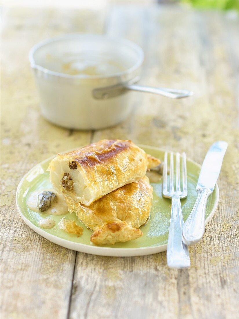 Asparagus in puff pastry with morel cream sauce