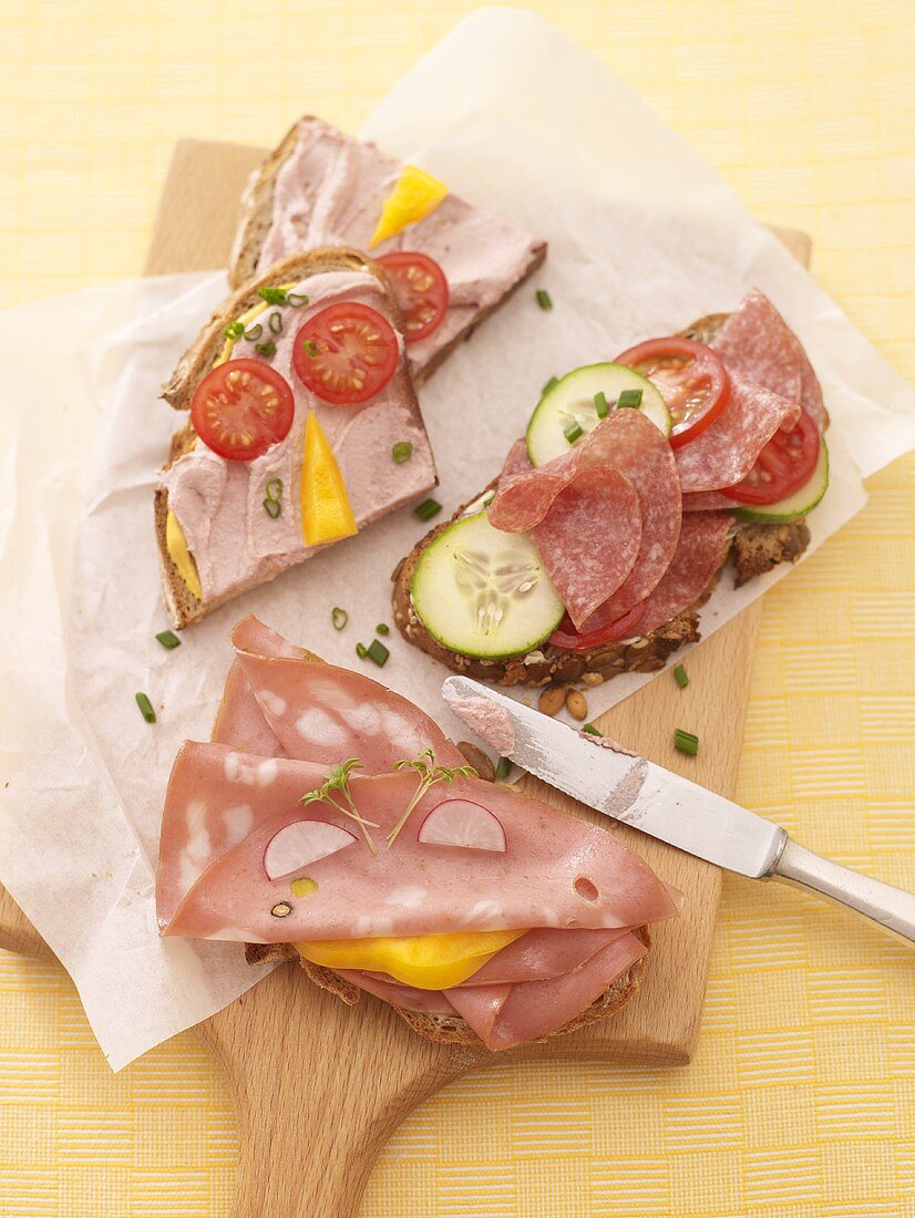 Mortadella, salami and liver sausage open sandwiches