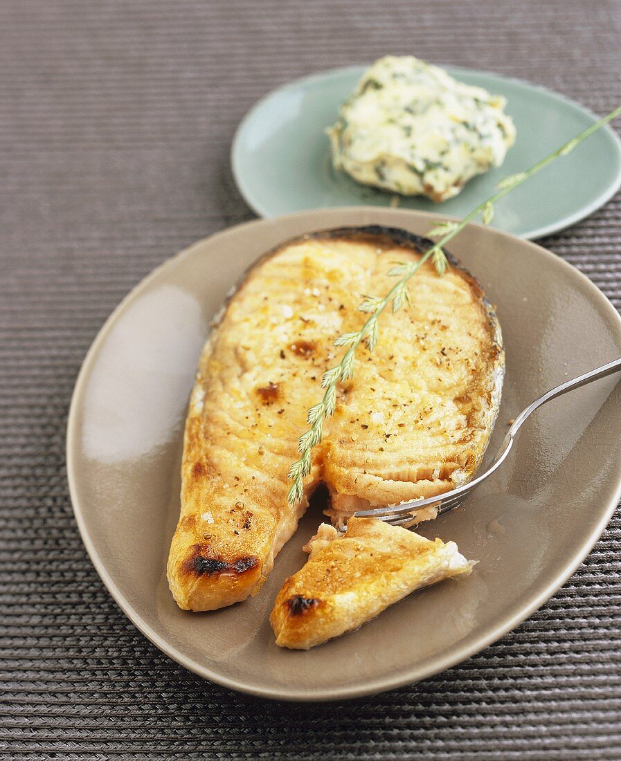 Salmon steak with herb butter