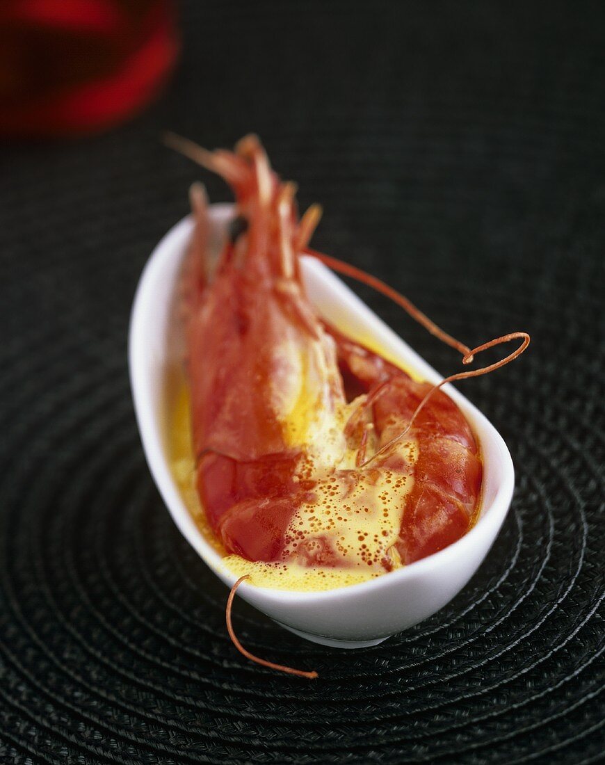 Cassolette of king prawns with curry sauce