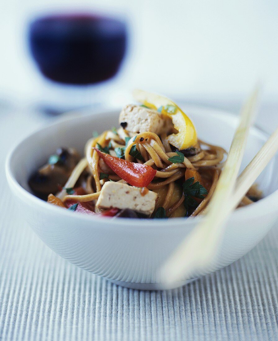 Asian noodle dish with tofu and peppers