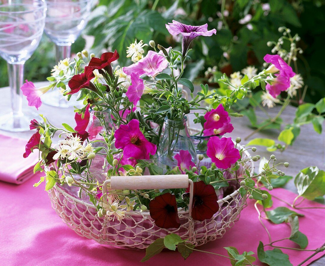 Basket of petunias and clematis