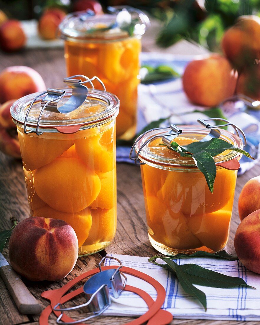 Bottled and fresh peaches