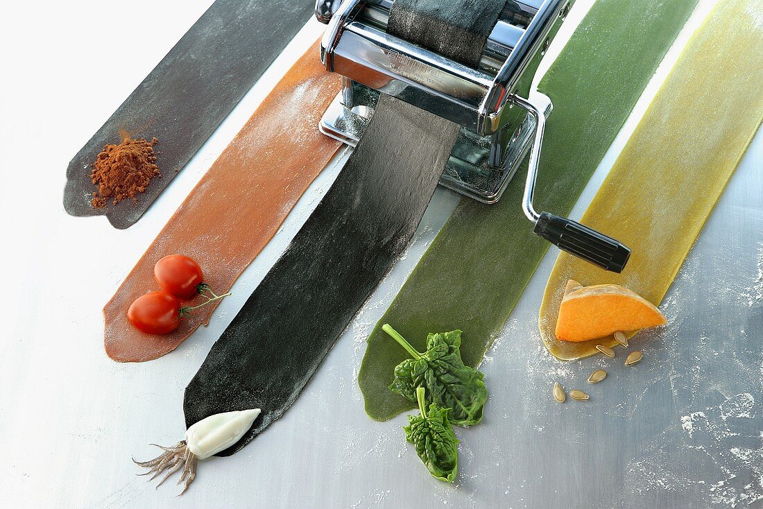 Coloured pasta with the relevant ingredients & pasta maker