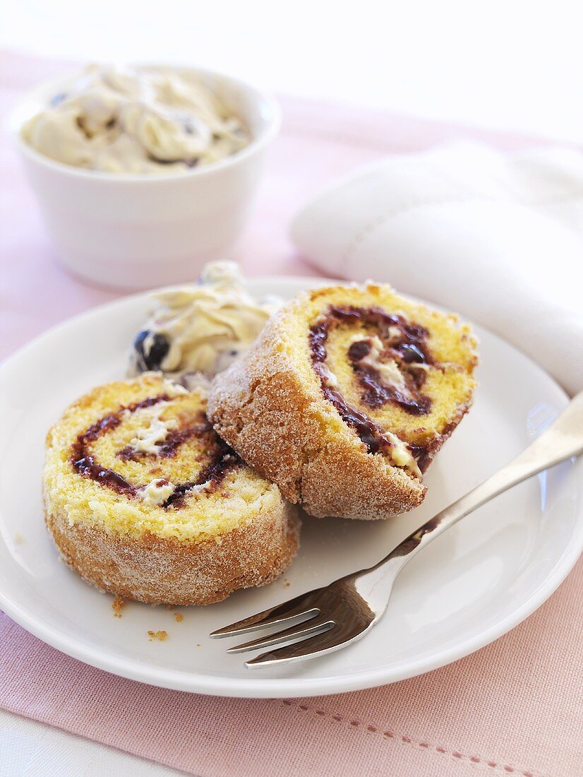Sponge roll with blueberry and cream filling