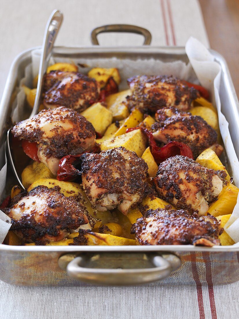 Chicken with honey and mustard in a roasting tin