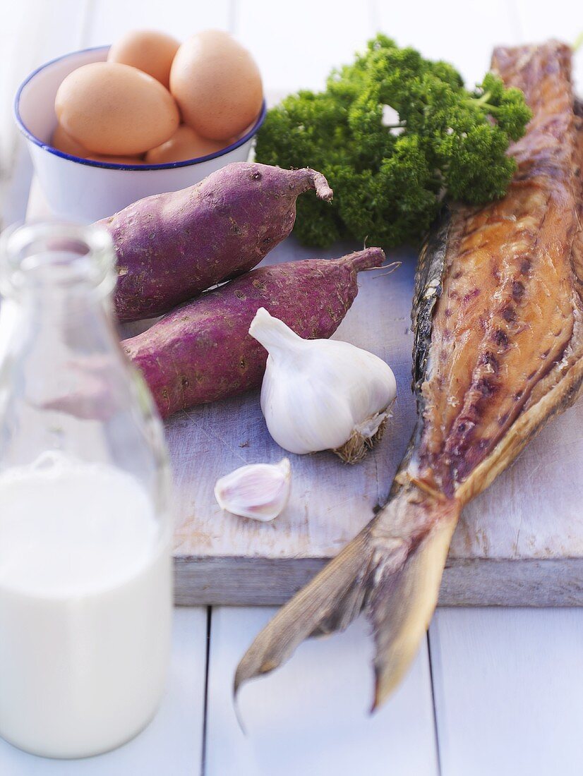 Still life with smoked fish, vegetables and eggs