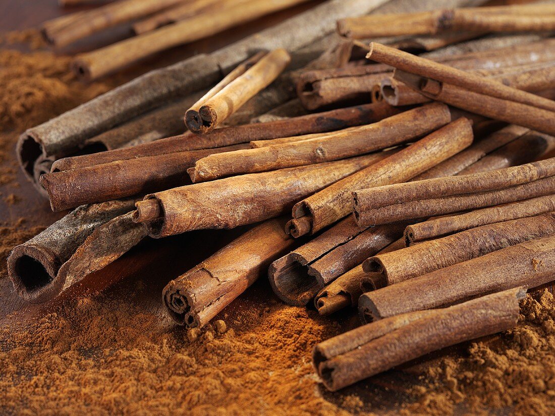 Cinnamon sticks on ground cinnamon (detail)