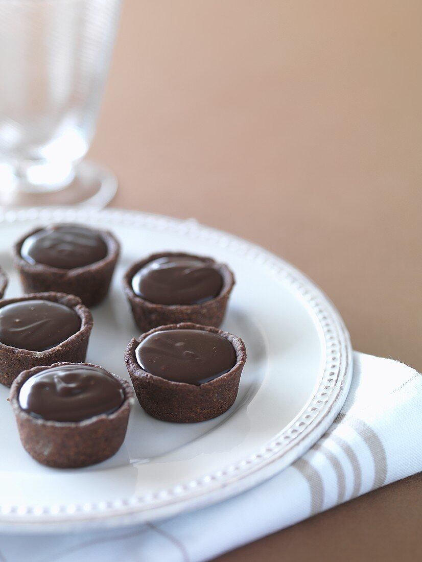 Several chocolate tarts