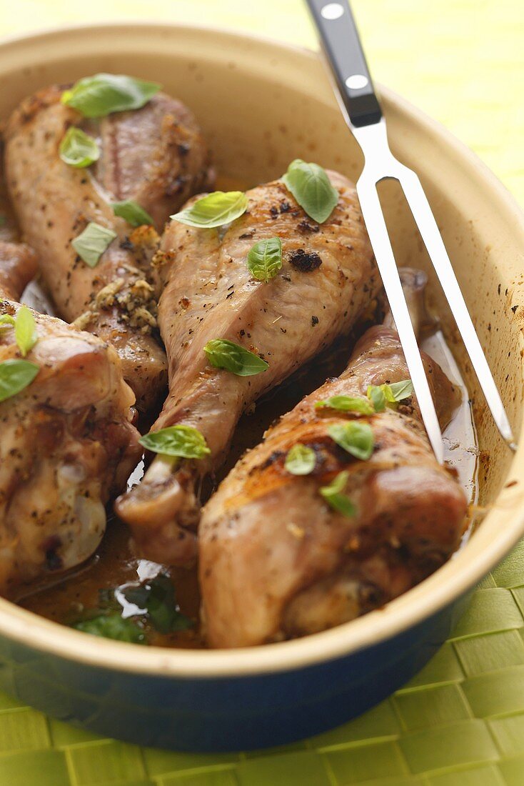 Braised turkey drumsticks with basil