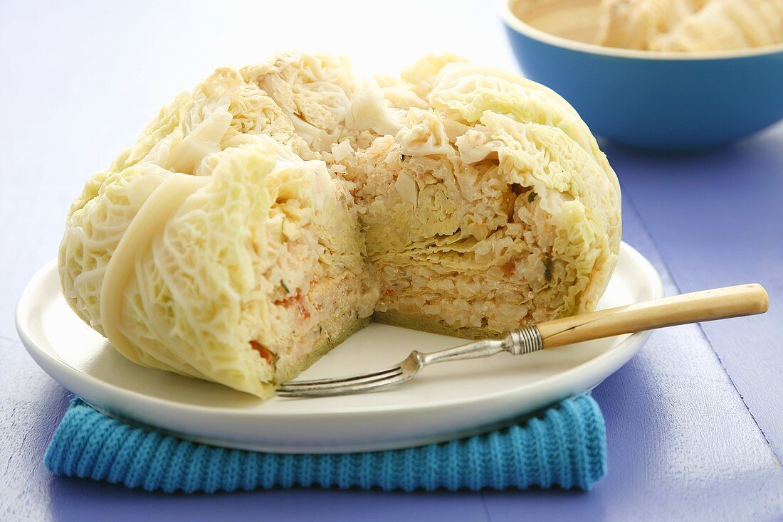 Cabbage stuffed with rice, tomatoes and Parmesan