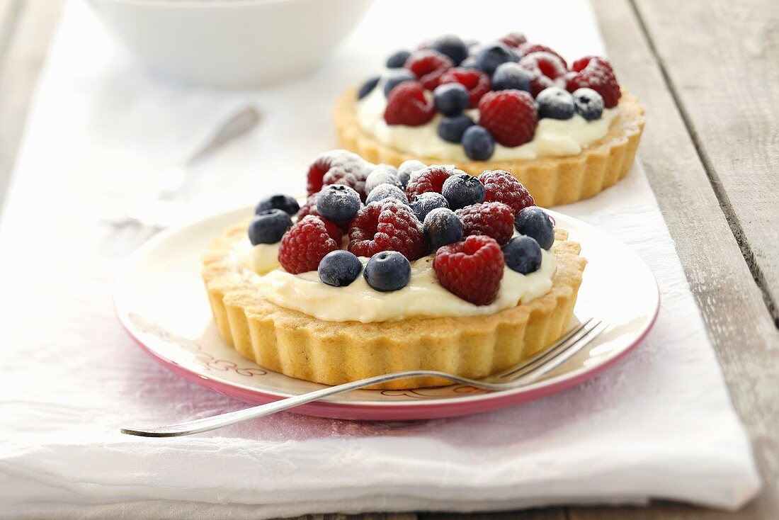 Creamy mixed berry flans