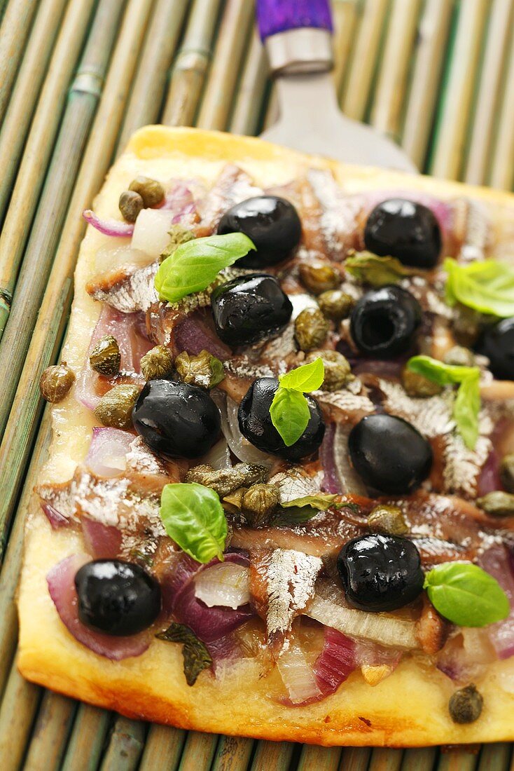 Pissaladière (Onion tart with anchovies, olives & capers)