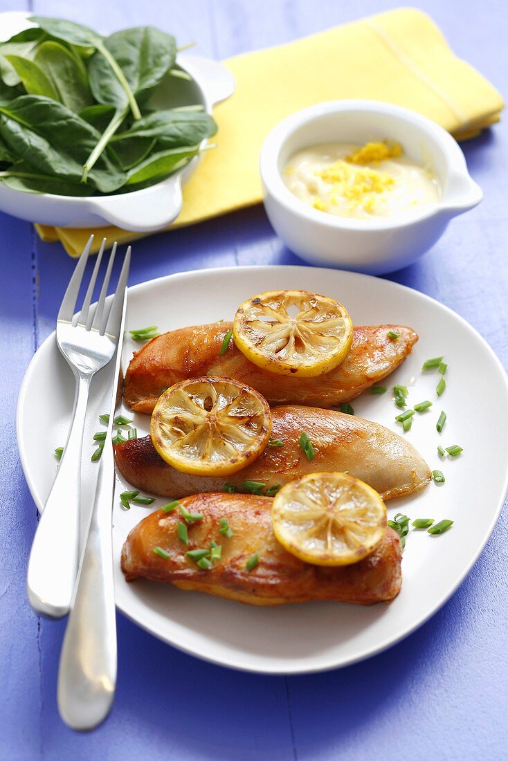 Chicken breasts with lemon slices