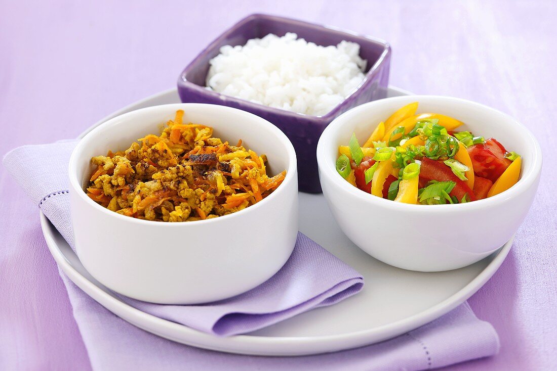 Curried pork with rice and pepper salad