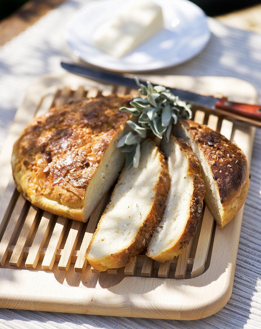 Bread with sage, partly sliced