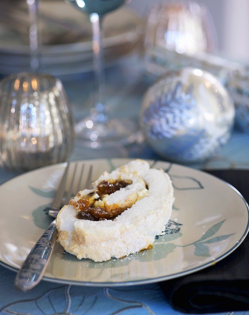 Meringue roulade filled with mincemeat and brandy cream