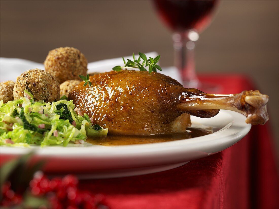 Roast goose leg with accompaniments