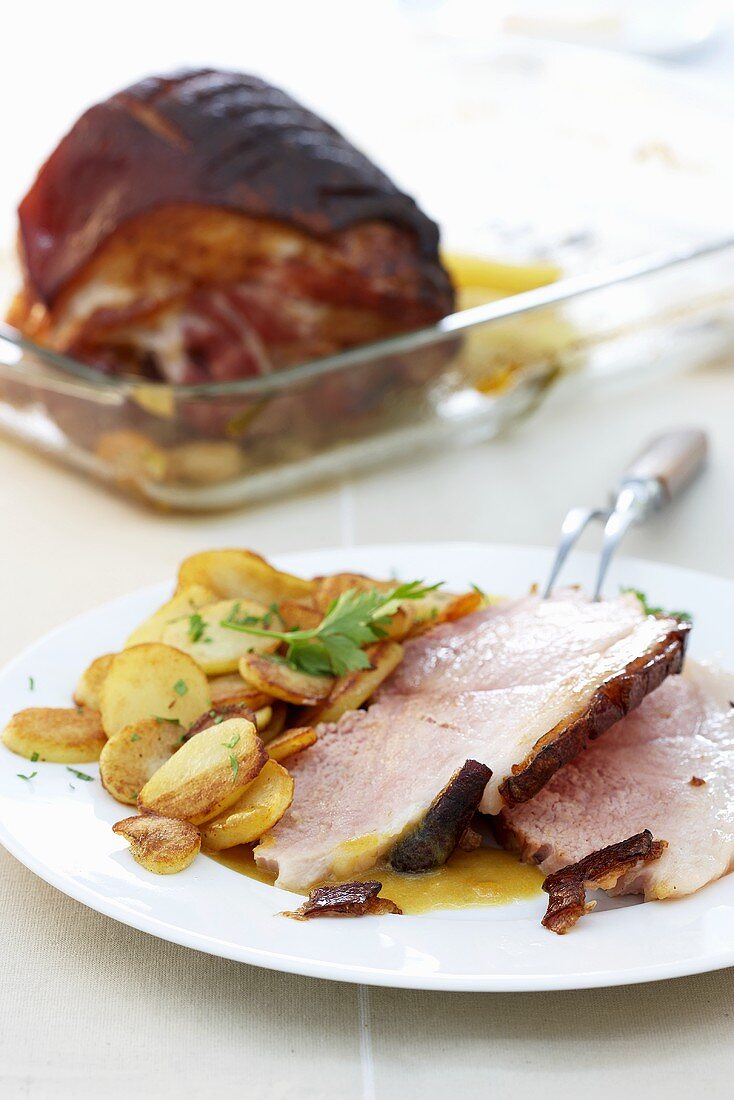 Roast pork with crackling and fried potatoes
