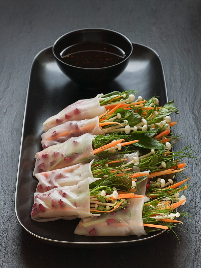 Spring rolls filled with pea sprouts & enokitake mushrooms