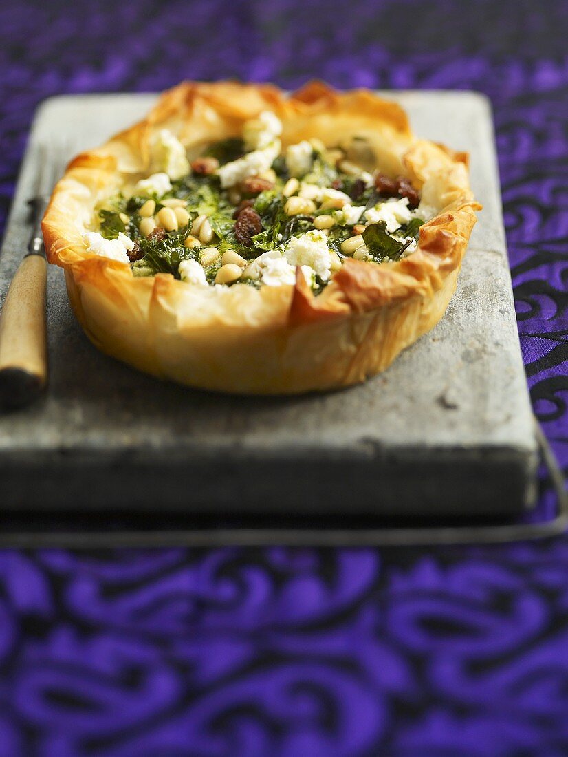 Spinach, feta and pine nut tart made with filo pastry