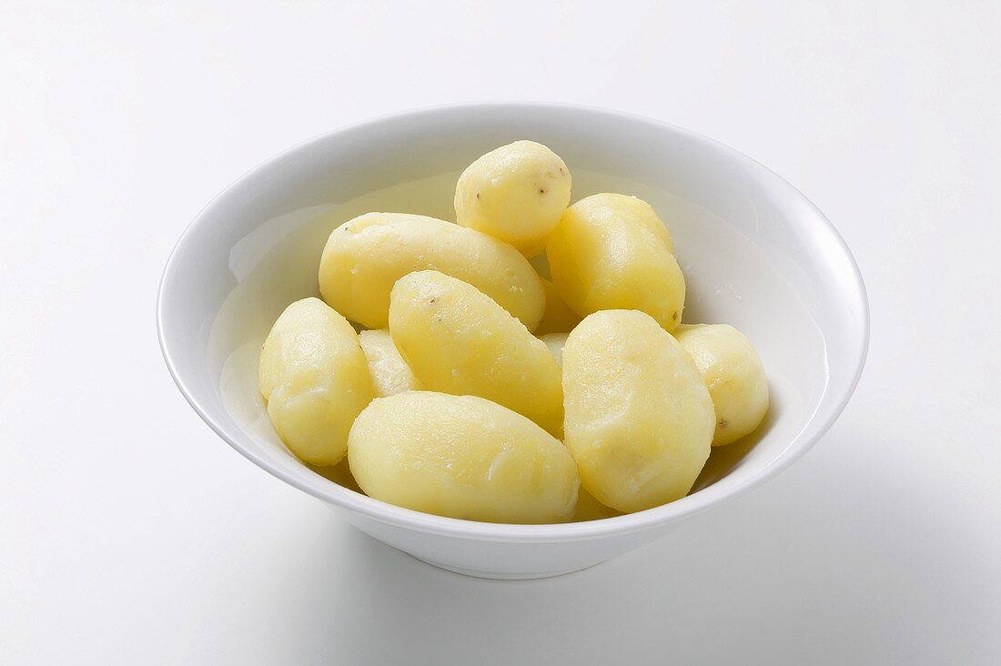 Potatoes boiled in their skins (peeled)