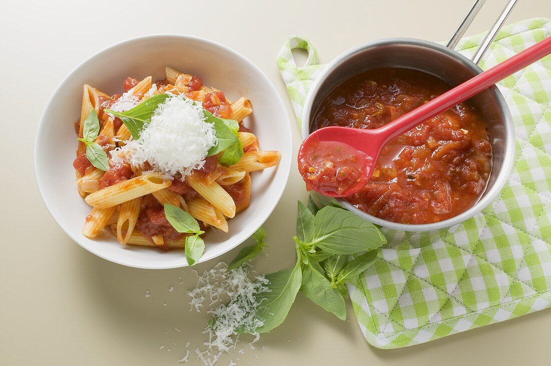 Penne in tomato sauce with basil