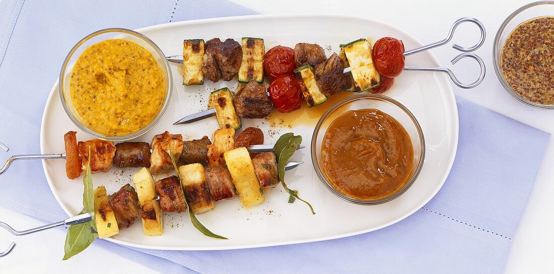 Grilled meat, chicken and vegetable kebabs