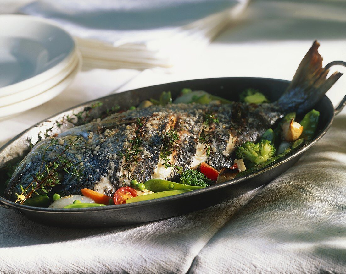 Sea bream with thyme and vegetables